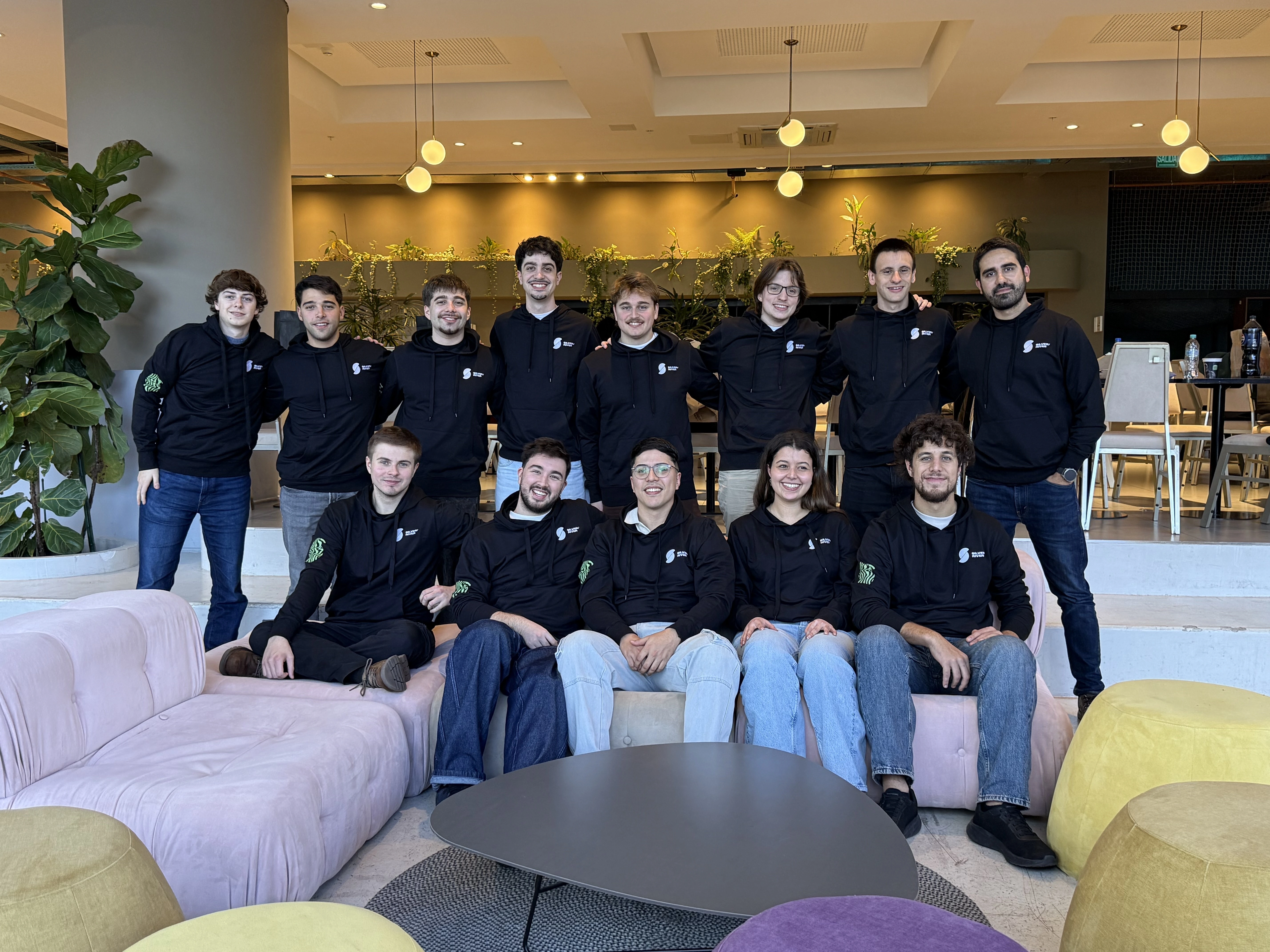 Illustrative photo of a team meeting around a shared table